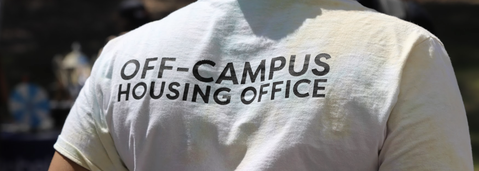 3 of 4, Off-Campus Logo behind a shirt 